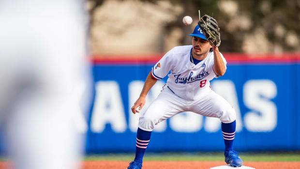 Chase Diggins catches a throw during warmups of a game between the Kansas Jayhawks and the Texas Southern Tigers.